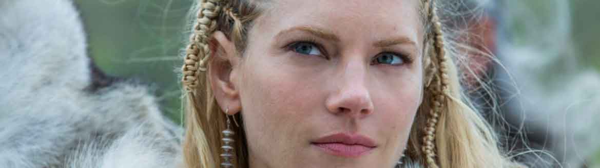 Tranças viking de Lagertha em cena da série Vikings com tutorial sobre cabelos medievais para mulheres